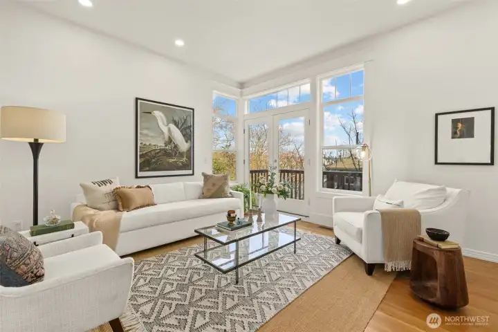Spacious living room with 9 ft tall ceilings