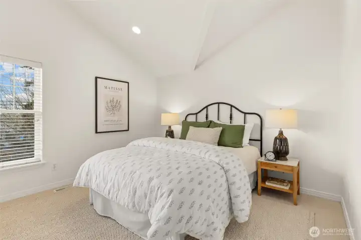 Primary Bedroom with vaulted ceiling