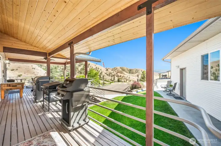 Relax on covered side deck with a view