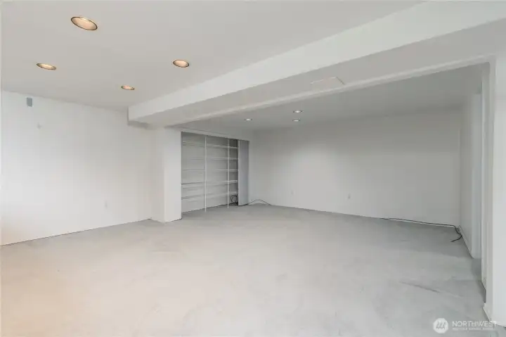Fully-finished daylight basement offers a huge rec room