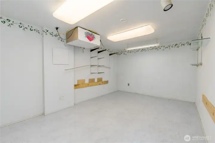 Large finished room in the basement - perfect for hobbies, crafts, home gym, media room, etc.