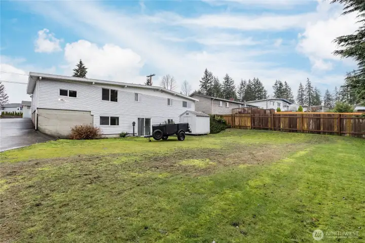 Expansive back yard with potential for detached garage/shop or DADU (or both!) - buyer to verify