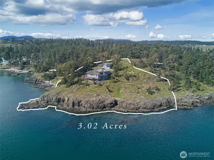 Rare point property encompassing 3.02± acres with approximately 640± feet of private shoreline, offering unmatched privacy and panoramic waterfront views on San Juan Island.