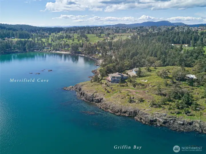 Ideally positioned between Griffin Bay and Merrifield Cove, this exceptional waterfront estate captures expansive, ever-changing marine vistas and iconic Mt. Baker views.