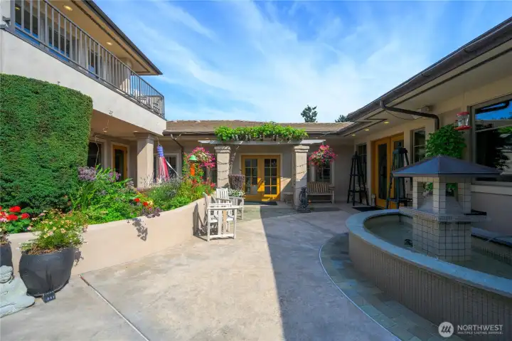 15283 Gibralter Rd private courtyard in full bloom