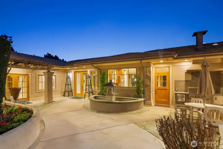 15283 Gibralter Rd custom fountain and outdoor grill in the private courtyard