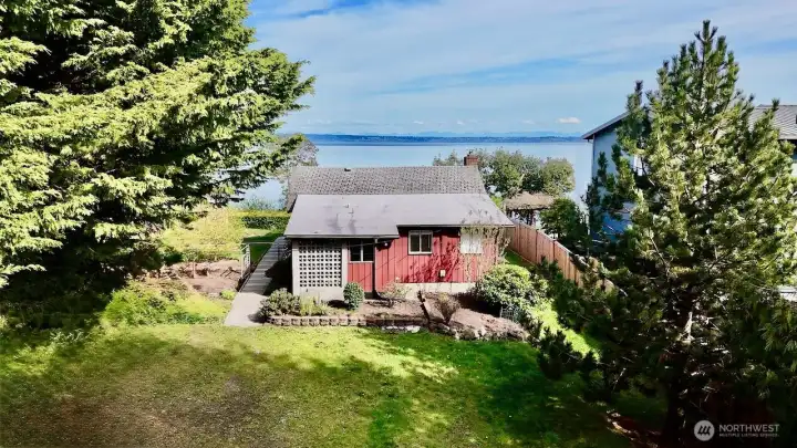 The perfect fixer set on a level lot with over 62' of bulkheaded waterftont.