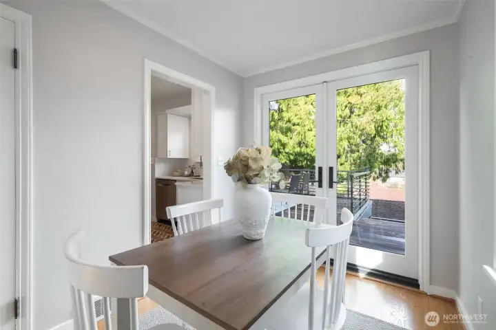 Formal dining room with new French doors to the private back deck.