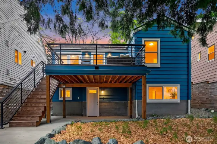 A great perspective of the 'sleeper' deck that keeps the lower patio dry.