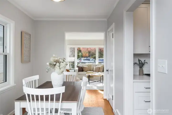 Back inside to the formal dining room, with a circular floorplan connecting the living room, dining and kitchen.