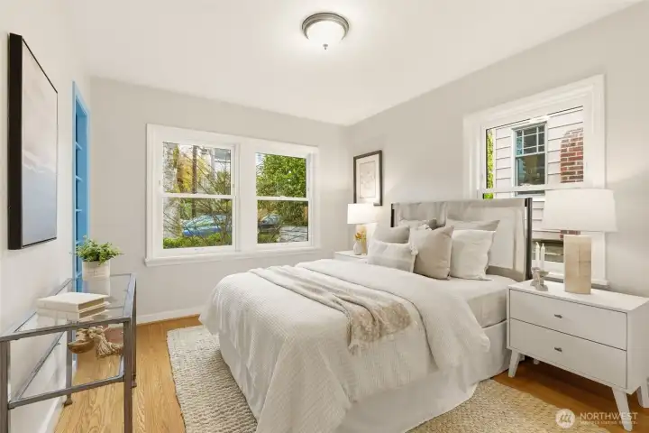 One of two bedrooms on the main with west facing light and many windows.