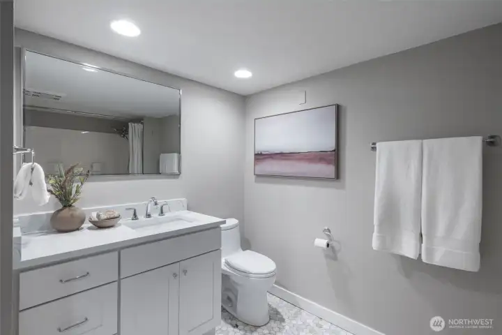 Full bath in the lower level is well appointed.