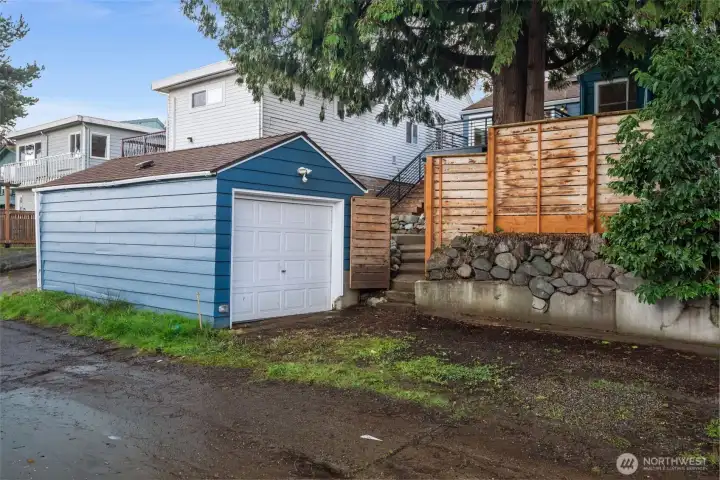 Easy alley access to the detached garage with outlets installed for EV charging opportunities.