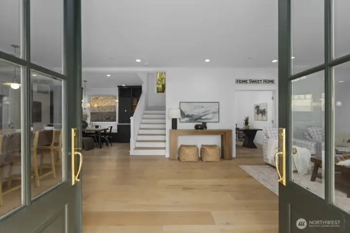 Gorgeous French doors create a seamless connection to outdoor living.