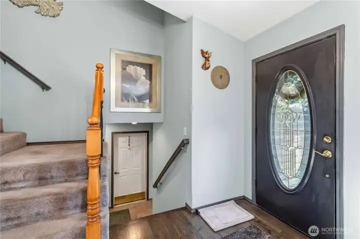 Welcome in! Stairs up to the bedrooms; stairs down to bedroom/bathroom and family room.
