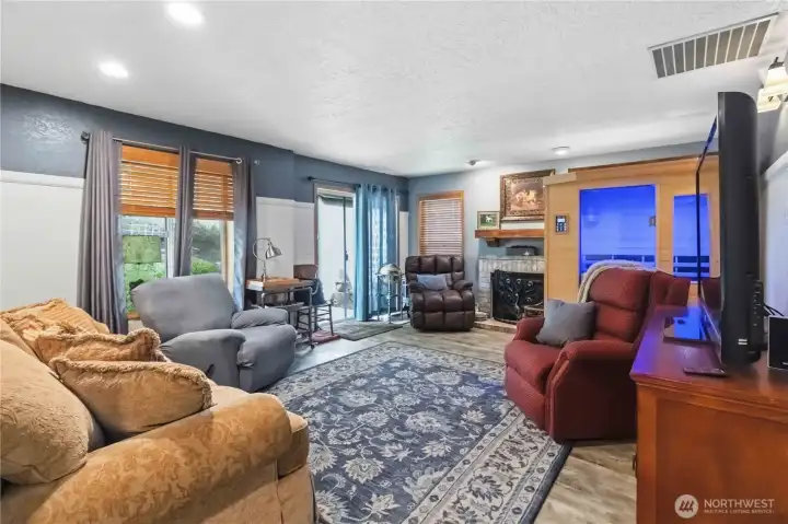Family room with doors out the backyard area
