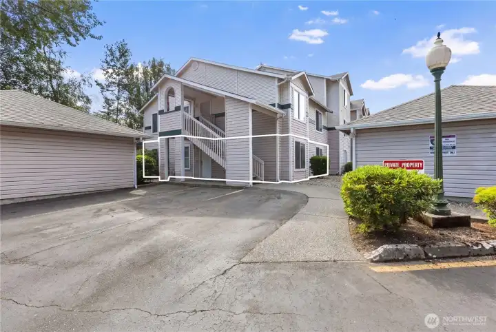 Ground floor unit with easy access and parking in front of the unit with private garage to the left of the parking