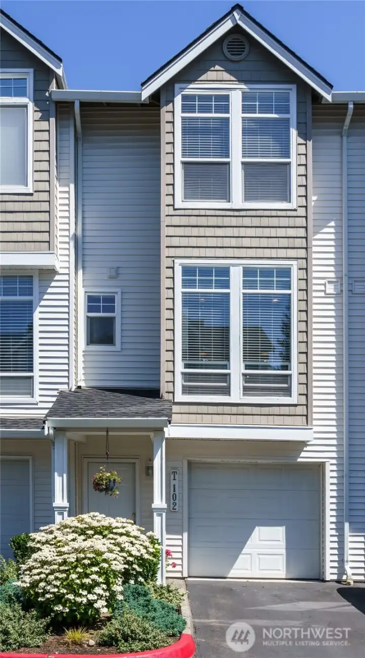 Welcoming entry to light filled spacious home.