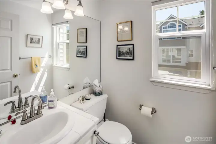 Steps away from great room, powder room again features natural light with it's own window.