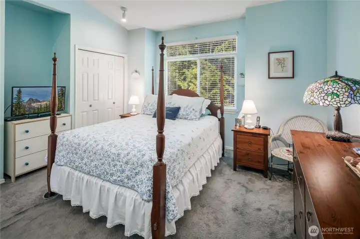 Large Primary room with spacious closet and room for dressers and chair.