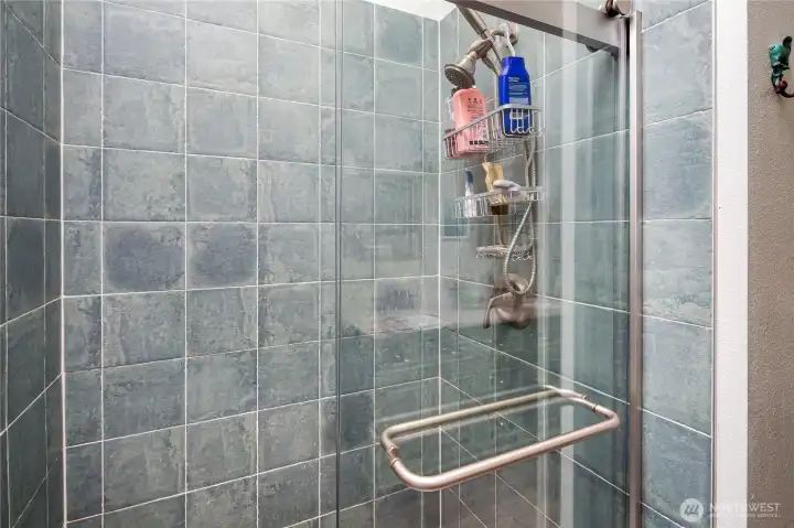 Oversized walk in luxury shower.