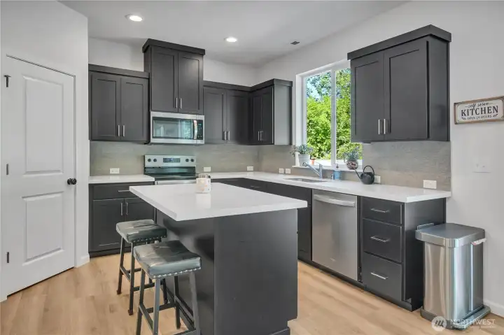Gorgeous kitchen includes stainless steel appliances. Gorgeous kitchen includes stainless steel appliances.