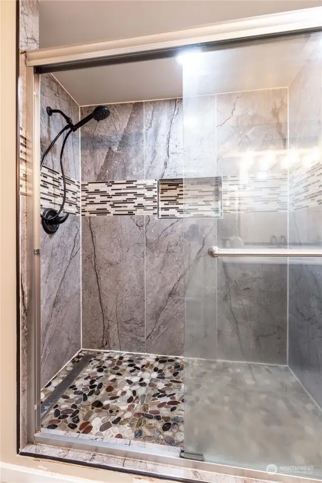 Another view of first bathroom. Gorgeous tiled shower