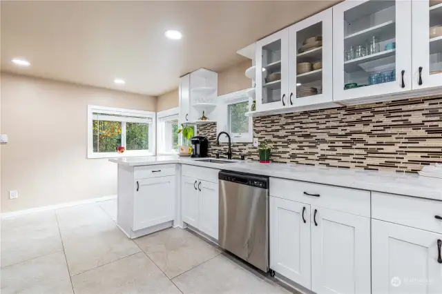 Kitchen with extra eating space. Quartz counters.