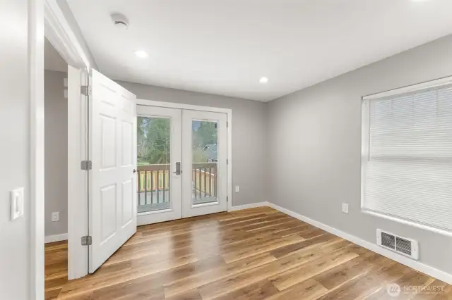 Private balcony off back bedroom.