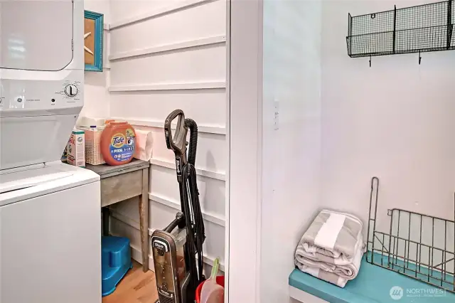Mud room adjacent to the kitchen + rear entry w/laundry.