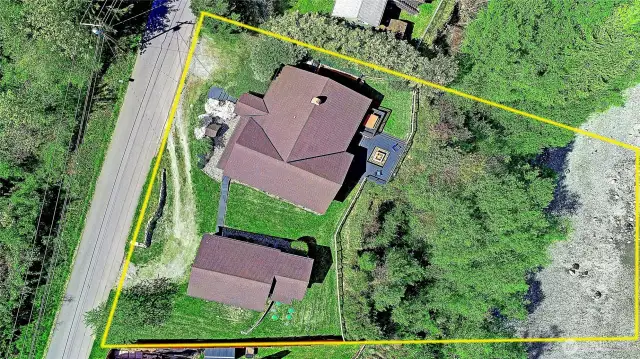 Double lot....purchased by the Sellers in 2014. Extensively renovated inside and out....a private well and NEW septic too! High bank, mature/established vegetation on hillsilde to approx 86 ft of waterfront. West facing views. Steps to boat launch, moor your boat to the bouy and miles and miles of beach fun.  Private, perfect and move in ready for island living.