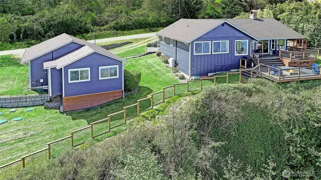 Peaceful, PERFECT double lot w/lots of parking. NEW paint, Fencing, windows, and NEW septic.