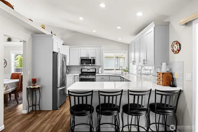 Vaulted ceiling and can lighting.