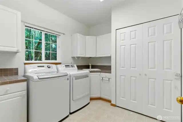The utility room is located on the main floor for easy access