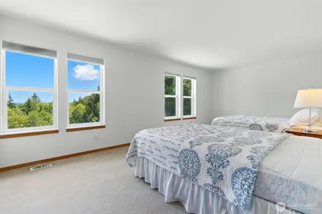 This large room has large windows and plenty of natural light