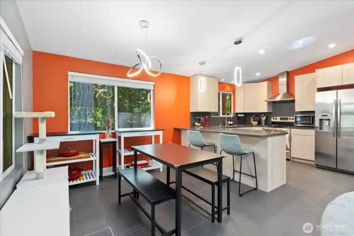 Dining room and kitchen eating spaces.