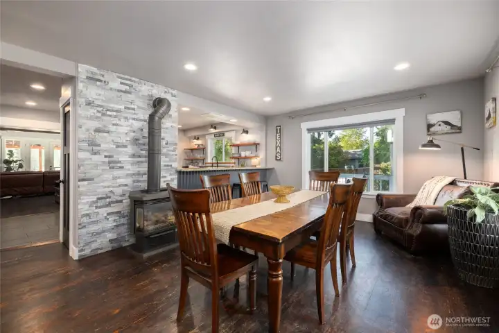 Dining room has the original rustic fir floors.