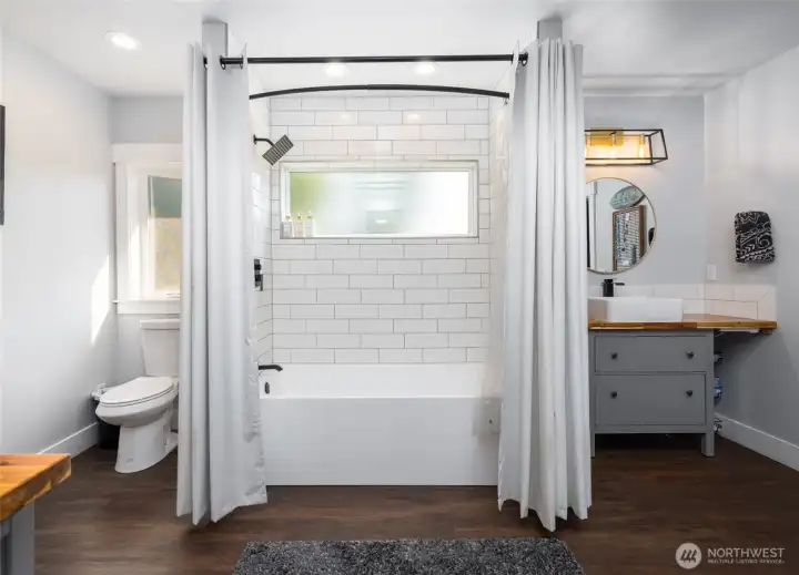Tub shower combo too! Large walk-in closet is just behind you.