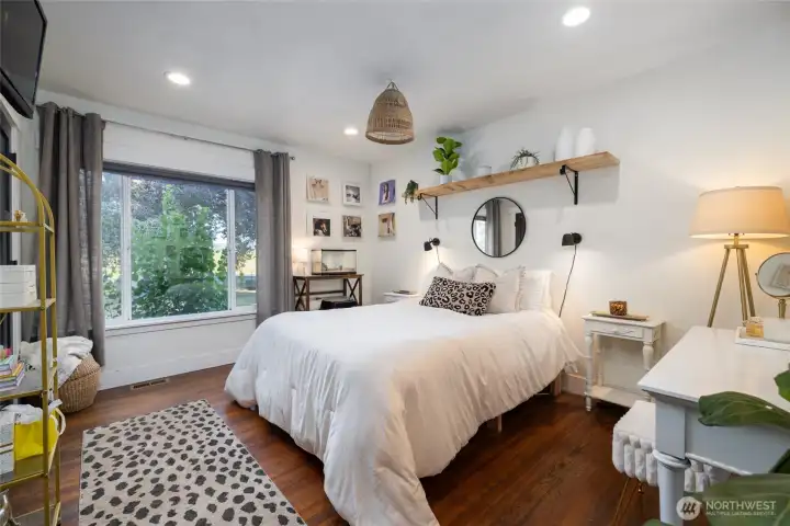 Second bedroom on main floor with adjacent shared bath.