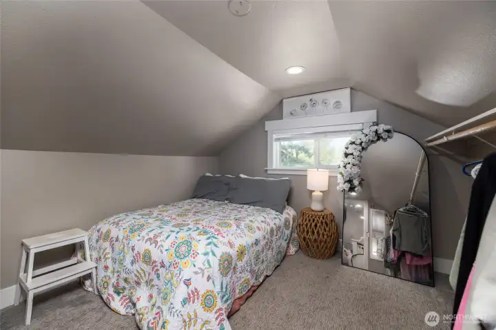 Second room on upper floor, could double as a work-out space or office.