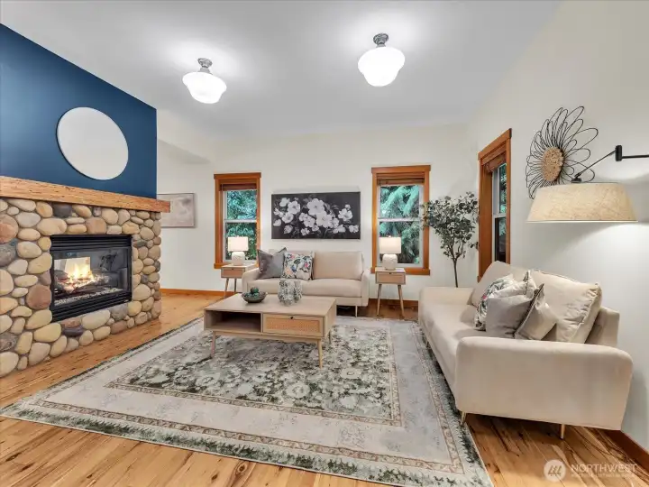 Living room with double sided gas fireplace.