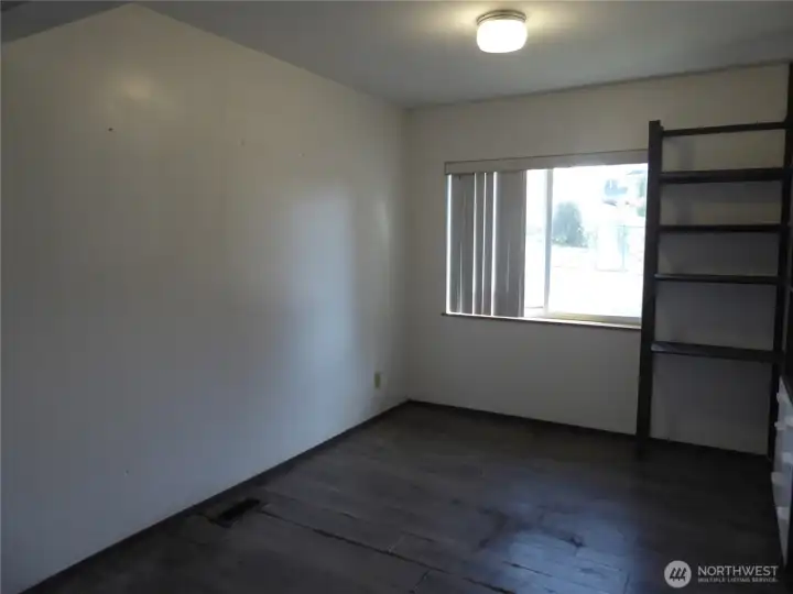 The dining room is spacious with built-ins.