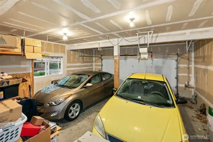Both units have attached 2-car garages