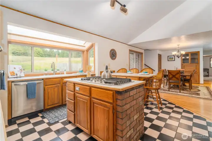 Center island with propane cook top for the chef of the home.