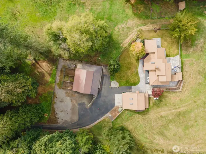 Overhead view of property showing great spaces for entertaining & relaxing in the front & back yards. Close proximity for parking in the covered garage. Views of your animals in the fenced pastures all around! Water available for pastures, as well as nearby outlets for electric fencing needs.