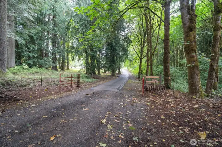 Paved, gated, private entrance to home.