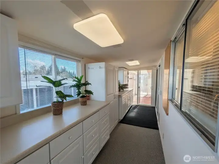 WOW! Look at all the storage. Glass doors in the background go to the back patio area.