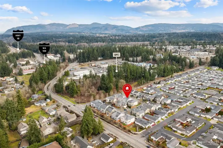 Aerial view of Maple Valley neighborhood showcasing proximity to parks, shopping, and amenities. Aerial view of Maple Valley neighborhood showcasing proximity to parks, shopping, and amenities.