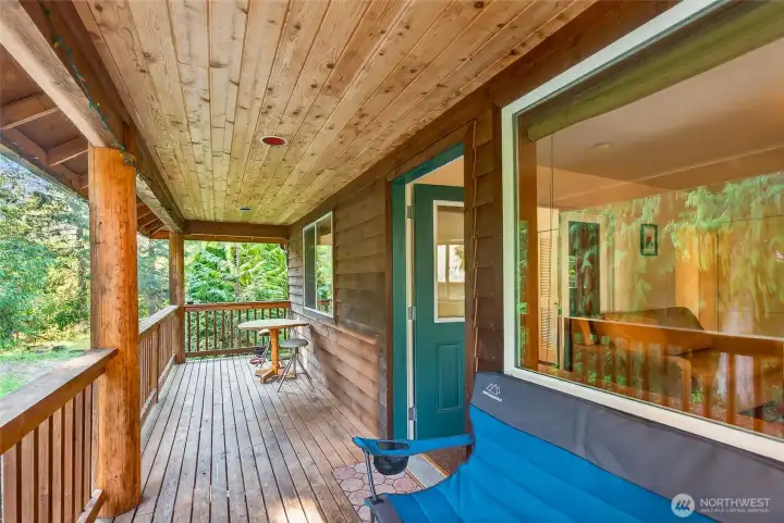 Kitchen balcony with built-in seating.