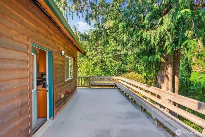 Kitchen balcony with built-in seating.